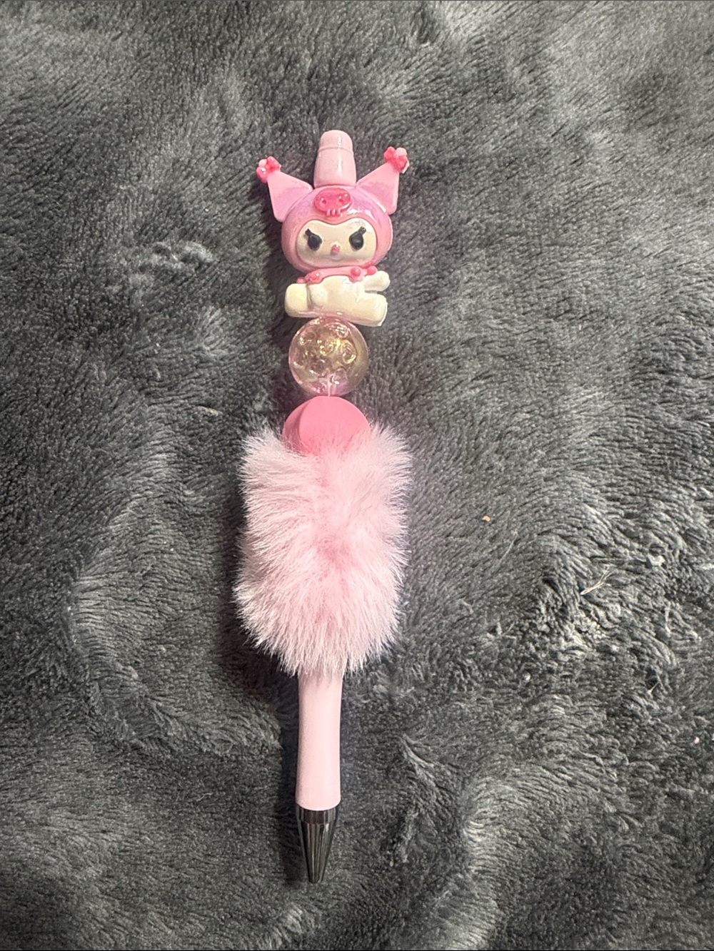 Pink fluffy beaded Kuku pen.